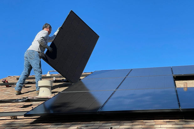 Rooftop solar panels being installed